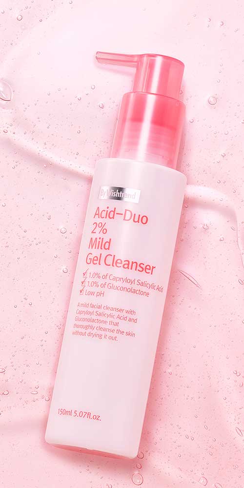 Mild gel cleanser bottle on pink textured background