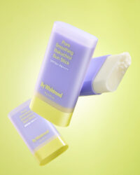 Three ByWishtrend sun sticks floating with light green background
