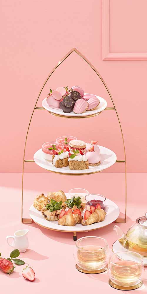 Three-tier dessert stand with Godiva pastries