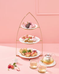 Three-tier dessert stand with Godiva pastries