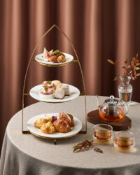 Elegant afternoon tea set with seasonal desserts and tea