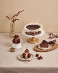 Autumn dessert table with chocolate cake and chestnut Mont Blanc