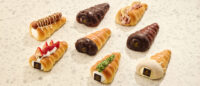Flatlay view of eight assorted Godiva cone breads