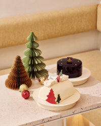 Christmas-themed chocolate cakes with festive tree decor Godiva cake photography by Studio AHNTONE