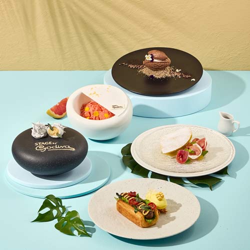 Summer-themed Godiva dessert styling with colorful dishes and bold lighting