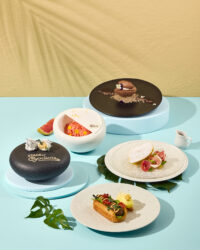 Summer-themed Godiva dessert styling with colorful dishes and bold lighting