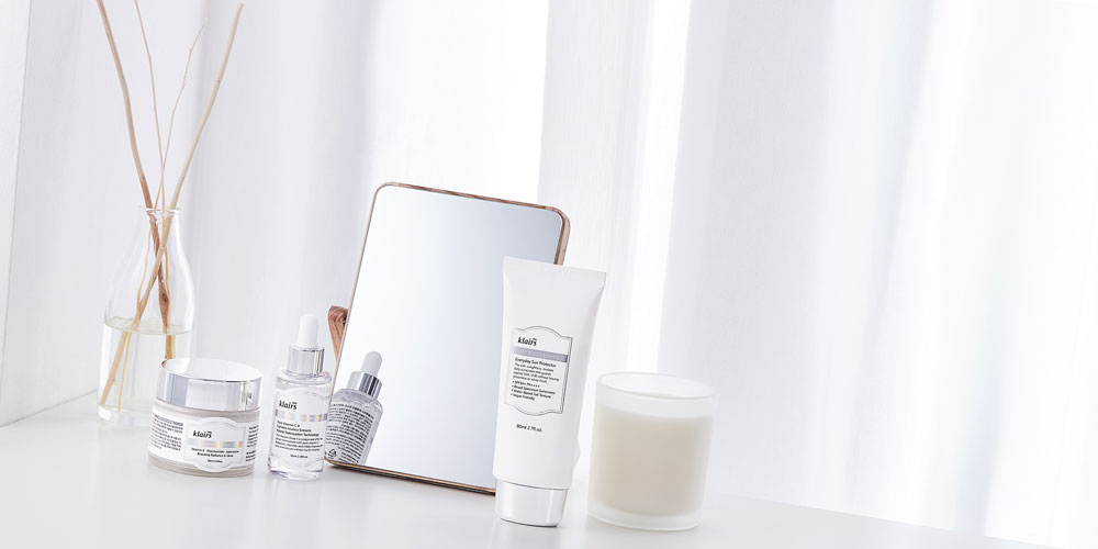 Minimal Beauty Routine on White Desk