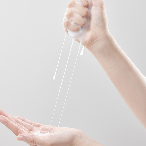 Milky Skincare Texture Squeezed from Hand
