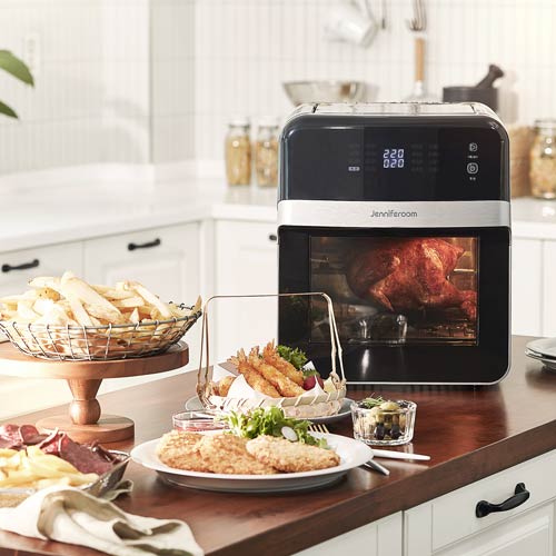 제니퍼룸 에어프라이어에서 조리 중인 로티세리 치킨과 감자튀김, 튀김 요리가 놓인 주방 테이블 세로 뷰 Jenniferroom air fryer with rotisserie chicken, fries, and fried food on kitchen table vertical composition