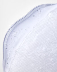 AAC 블루리페어 시트 마스크에 흡수된 젤 텍스처 디테일 사진 A close-up texture shot of AAC Blue Repair sheet mask soaked with hydrating gel