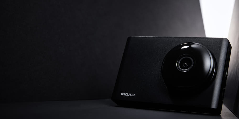 IROAD Blackbox Product Photo – Sleek Design Highlighted with Strong Light in Dark Minimal Setting