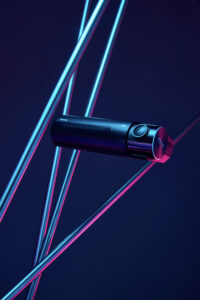 네온 조명 속에 설치된 아이로드 X10Pro 블랙박스 제품 사진 Photo of IROAD X10Pro dashcam highlighted with neon lights