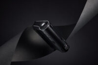 어두운 스튜디오 배경에서 촬영된 아이로드 X10Pro 블랙박스 광고용 제품 사진 IROAD X10Pro dashcam advertising product photo with dark studio styling