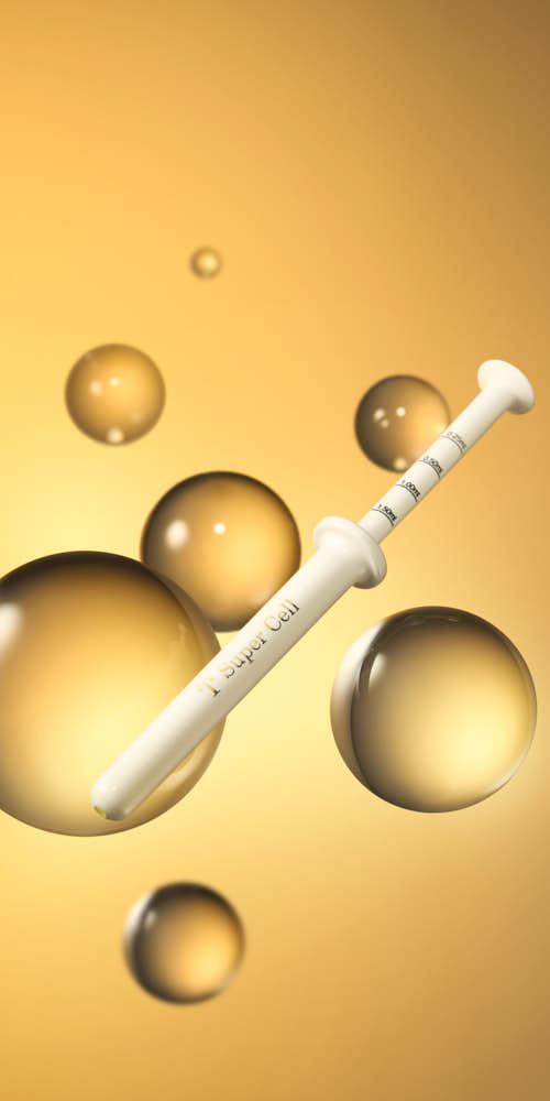 Jenacell 세럼 주사기가 골드 버블 사이에 떠 있는 제품 사진 Jenacell serum syringe floating among golden bubbles